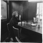 Diane Arbus, Woman at a counter smoking, N.Y.C., 1962